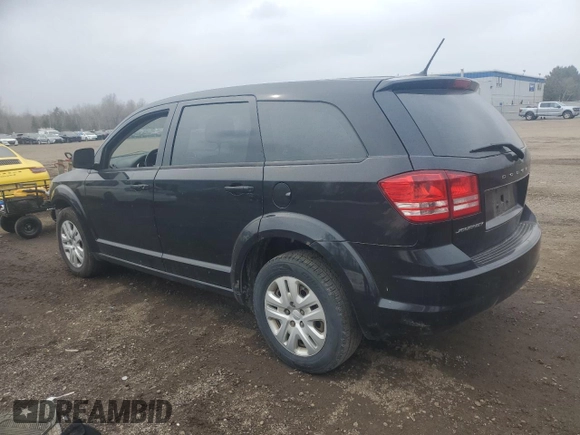 2015 Dodge Journey American Value with VIN 3C4PDCAB3FT520452, listed as a Copart auction lot 52591255 with 299,871 mi miles and Clean Title. Bid and sale history available at DreamBid. Image 2.