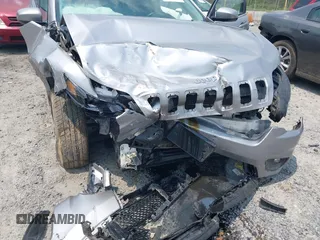 2019 Jeep Cherokee Latitude Plus with VIN 1C4PJLLB3KD184842, listed as a IAAI auction lot 42389142 with 123,324 mi miles and . Bid and sale history available at DreamBid. Image 6.