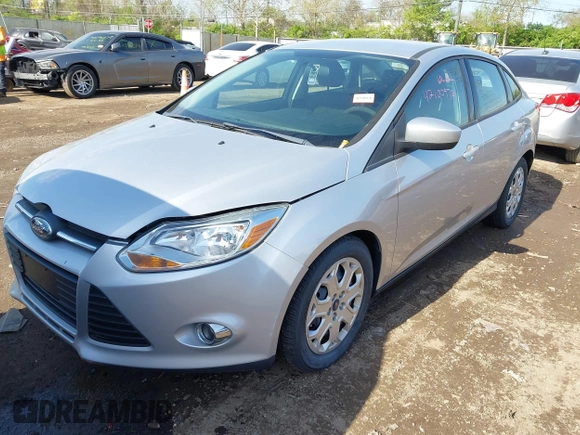 2012 Ford Focus SE with VIN 1FAHP3F20CL372391, listed as a IAAI auction lot 42100970 with 126,112 mi miles and . Bid and sale history available at DreamBid. Image 2.