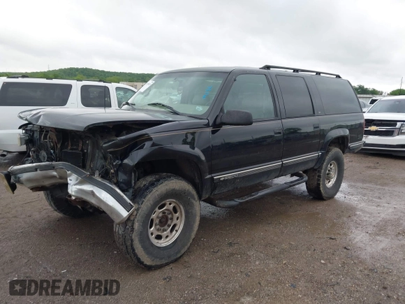 1999 Chevrolet Suburban with VIN 3GNGK26J8XG220021, listed as a IAAI auction lot 42145815 with 172,956 mi miles and . Bid and sale history available at DreamBid. Image 2.