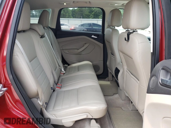 2014 Ford Escape Titanium с VIN 1FMCU0J98EUD63592, выставлен на аукционе Copart как лот 51737595 с пробегом 69 223 миль миль и На запчасти • Non repairable. История ставок и продаж доступна на DreamBid. Изображение 11.