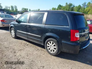 2013 Chrysler Town & Country Touring with VIN 2C4RC1BG3DR759137, listed as a IAAI auction lot 42138138 with 196,397 mi miles. Bid and sale history available at carsss.com. Image 3.