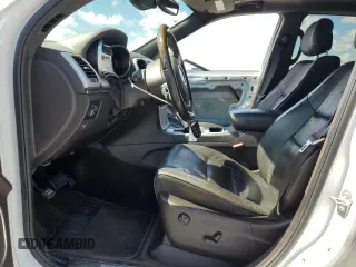 2018 Jeep Grand Cherokee Summit с VIN 1C4RJEJG7JC228316, выставлен на аукционе Copart как лот 57062435 с пробегом 99 442 миль миль и Списание • Salvage title. История ставок и продаж доступна на DreamBid. Изображение 7.