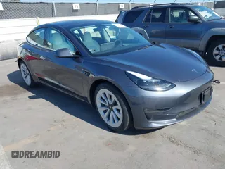2023 Tesla Model 3 Long Range z VIN 5YJ3E1EB7PF704061, wystawiony jako IAAI lot #42079045 z przebiegiem 4 012 mil mil oraz . Historia ofert i sprzedaży dostępna na DreamBid. Obrazek 1.