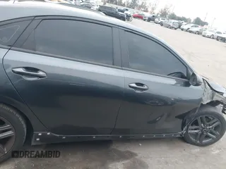 2021 Kia Forte GT-Line z VIN 3KPF34AD9ME316424, wystawiony jako IAAI lot #41467687 z przebiegiem 86 059 mil mil oraz . Historia ofert i sprzedaży dostępna na DreamBid. Obrazek 14.