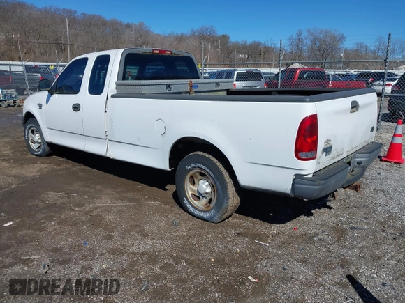 2002 Ford F-150 XL with VIN 1FTRX17L72NA76720, listed as a IAAI auction lot 41738935 with 92,506 mi miles. Bid and sale history available at carsss.com. Image 3.