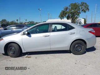 2014 Toyota Corolla L with VIN 2T1BURHE5EC006925, listed as a IAAI auction lot 40917569 with 130,761 mi miles and . Bid and sale history available at DreamBid. Image 14.