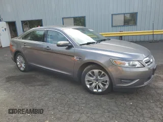 2011 Ford Taurus Limited with VIN 1FAHP2FW4BG139747, listed as a Copart auction lot 59590815 with 131,600 mi miles and Salvage title. Bid and sale history available at DreamBid. Image 4.