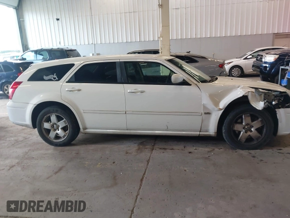 2006 Dodge Magnum SXT with VIN 2D4GZ47V56H344931, listed as a IAAI auction lot 41301668 with 132,916 mi miles and . Bid and sale history available at DreamBid. Image 13.