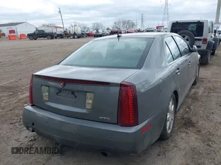 2006 Cadillac STS z VIN 1G6DW677860129248, wystawiony jako IAAI lot #42042675 z przebiegiem 152 956 mil mil oraz . Historia ofert i sprzedaży dostępna na DreamBid. Obrazek 4.