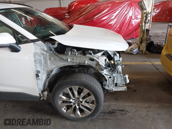 2020 Toyota RAV4 XLE Premium with VIN 2T3C1RFV1LC042163, listed as a IAAI auction lot 40672979 with 76,016 mi miles. Bid and sale history available at carsss.com. Image 6.