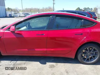 2022 Tesla Model 3 Long Range with VIN 5YJ3E1EB1NF272452, listed as a IAAI auction lot 41897358 with 78,458 mi miles and . Bid and sale history available at DreamBid. Image 14.