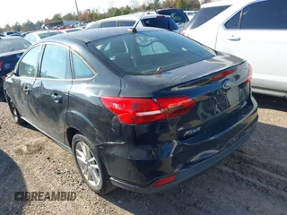 2015 Ford Focus SE with VIN 1FADP3F25FL384068, listed as a IAAI auction lot 40994199 with 1 mi miles. Bid and sale history available at carsss.com. Image 3.