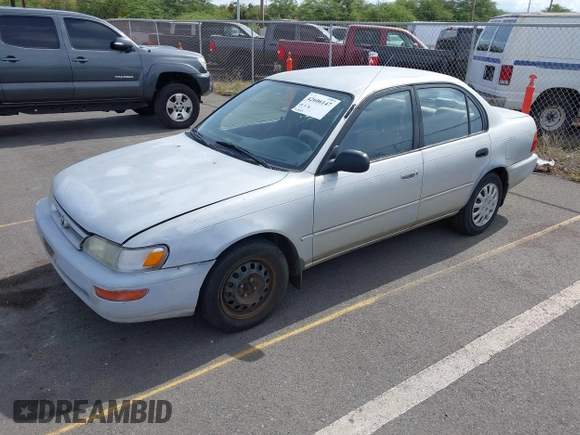 1994 Toyota Corolla Deluxe with VIN JT2AE09B5R0053731, listed as a IAAI auction lot 42606147 with 117,035 mi miles and . Bid and sale history available at DreamBid. Image 2.
