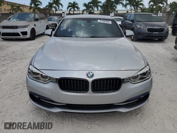 2018 BMW 3 Series 330i xDrive with VIN WBA8D9C50JEM33631, listed as a Copart auction lot 57595925 with 96,582 mi miles and Salvage title. Bid and sale history available at DreamBid. Image 5.