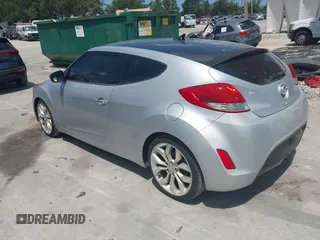 2012 Hyundai Veloster w/Gray Int with VIN KMHTC6ADXCU028115, listed as a IAAI auction lot 42361550 with 118,920 mi miles and . Bid and sale history available at DreamBid. Image 3.