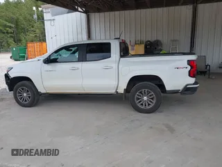 2023 Chevrolet Colorado 4WD LT z VIN 1GCPTCEK0P1221796, wystawiony jako IAAI lot #42076600 z przebiegiem 23 262 mil mil oraz . Historia ofert i sprzedaży dostępna na DreamBid. Obrazek 14.