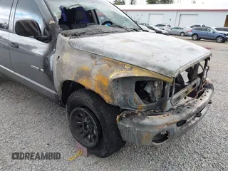 2006 Dodge 1500 SLT with VIN 1D7HU18216S601553, listed as a IAAI auction lot 42257206 with Not provided miles and . Bid and sale history available at DreamBid. Image 6.