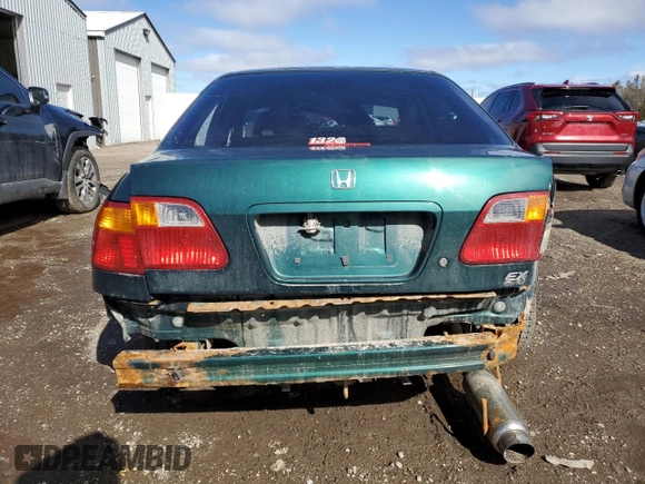 1999 Honda Civic z VIN 2HGEJ6685XH916327, wystawiony jako Copart lot #49142465 z przebiegiem 149 067 mil mil oraz Czysty tytuł • Clean title. Historia ofert i sprzedaży dostępna na DreamBid. Obrazek 6.
