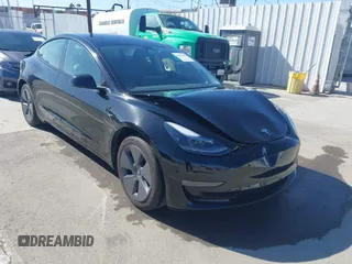 2023 Tesla Model 3 Long Range z VIN 5YJ3E1EB9PF680071, wystawiony jako IAAI lot #41856498 z przebiegiem 18 184 mil mil oraz . Historia ofert i sprzedaży dostępna na DreamBid. Obrazek 1.