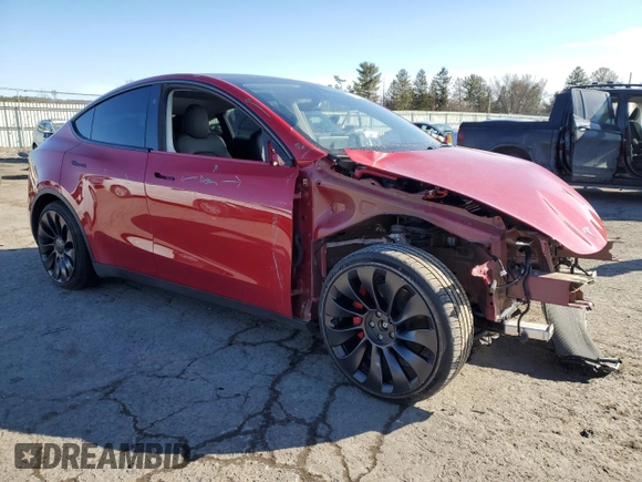 2023 Tesla Model Y Performance with VIN 7SAYGDEFXPF790747, listed as a Copart auction lot 42233855 with 25,452 mi miles and Salvage Title. Bid and sale history available at DreamBid. Image 4.