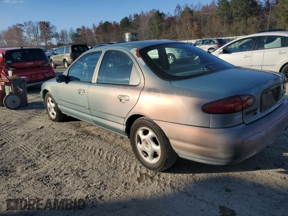 1997 Ford Contour with VIN 3FALP6535VM112253, listed as a Copart auction lot 80501924 with 116,778 mi miles and Salvage title. Bid and sale history available at DreamBid. Image 2.