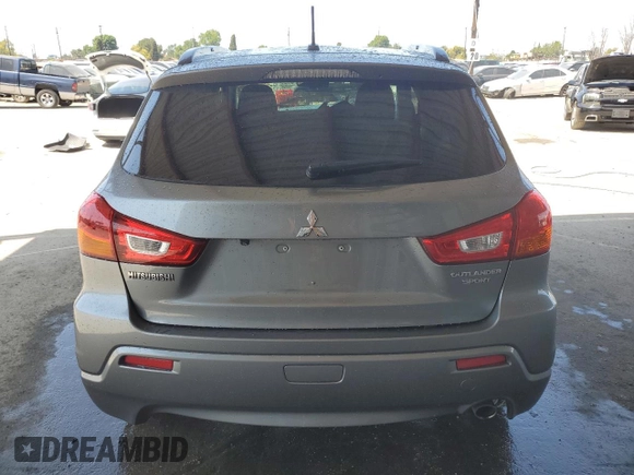 2012 Mitsubishi Outlander SE with VIN JA4AP4AU4CZ006855, listed as a Copart auction lot 52328845 with 144,787 mi miles and Salvage title. Bid and sale history available at DreamBid. Image 6.