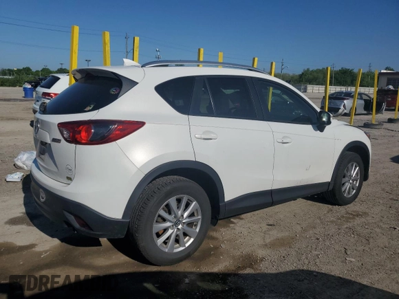 2016 Mazda CX-5 Touring z VIN JM3KE2CYXG0683673, wystawiony jako Copart lot #56724025 z przebiegiem 107 293 mil mil oraz Szkoda całkowita • Salvage title. Historia ofert i sprzedaży dostępna na DreamBid. Obrazek 3.