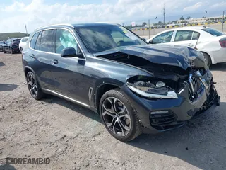 2021 BMW X5 sDrive40i with VIN 5UXCR4C01M9G07906, listed as a IAAI auction lot 41847036 with 16,307 mi miles. Bid and sale history available at carsss.com. Image 1.