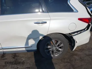 2015 Infiniti QX60 z VIN 5N1AL0MM8FC517929, wystawiony jako IAAI lot #42118295 z przebiegiem 104 188 mil mil oraz . Historia ofert i sprzedaży dostępna na DreamBid. Obrazek 17.
