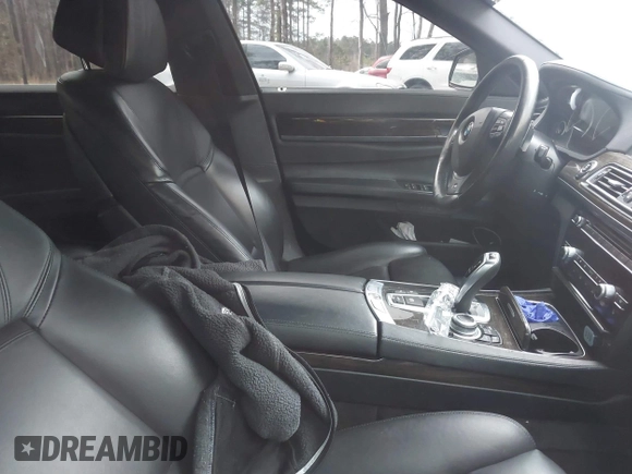 2013 BMW 7 Series 750i xDrive with VIN WBAYB6C59DD223947, listed as a IAAI auction lot 41585255 with Not provided miles and . Bid and sale history available at DreamBid. Image 5.