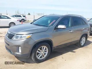 2014 Kia Sorento LX with VIN 5XYKT4A76EG462311, listed as a IAAI auction lot 41884030 with 139,030 mi miles and . Bid and sale history available at carsss.com. Image 2.