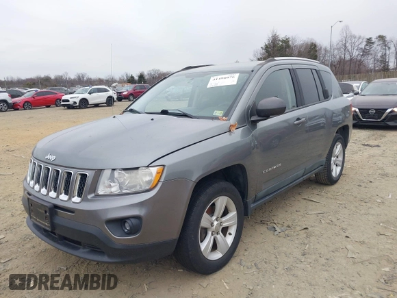 2011 Jeep Compass with VIN 1J4NT1FA2BD241485, listed as a IAAI auction lot 41496076 with 134,825 mi miles. Bid and sale history available at carsss.com. Image 6.