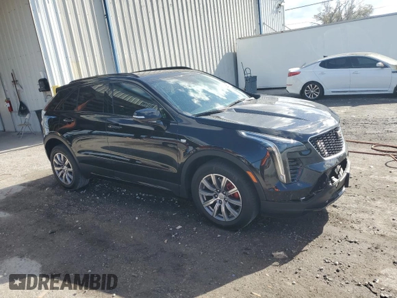 2021 Cadillac XT4 FWD Sport with VIN 1GYFZER44MF080872, listed as a Copart auction lot 86344534 with 23,865 mi miles and Salvage Title. Bid and sale history available at DreamBid. Image 4.