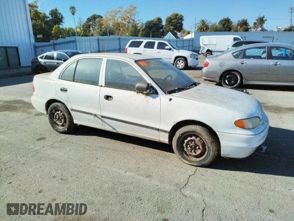 1997 Hyundai Accent z VIN KMHVF24NXVU373676, wystawiony jako Copart lot #77866484 z przebiegiem 151 949 mil mil oraz Tytuł czysty. Historia ofert i sprzedaży dostępna na DreamBid. Obrazek 4.