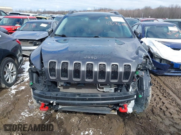 2017 Jeep Cherokee Trailhawk z VIN 1C4PJMBS0HW649422, wystawiony jako IAAI lot #41696815 z przebiegiem 62 185 mil mil oraz . Historia ofert i sprzedaży dostępna na DreamBid. Obrazek 13.