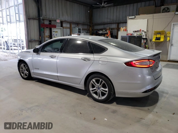 2016 Ford Fusion Titanium Hybrid with VIN 3FA6P0RUXGR355351, listed as a Copart auction lot 56516025 with 117,964 mi miles and Salvage title. Bid and sale history available at DreamBid. Image 2.
