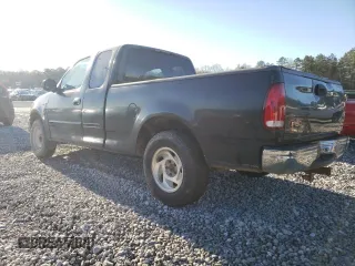 1999 Ford F-150 XL with VIN 1FTRX17L9XNA53124, listed as a Copart auction lot 49214405 with Not Provided miles and Salvage Title. Bid and sale history available at carsss.com. Image 2.