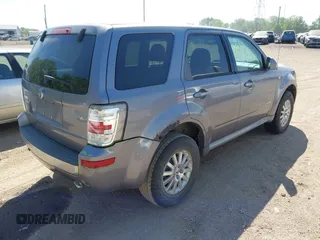 2008 Mercury Mariner Premier z VIN 4M2CU87168KJ15064, wystawiony jako IAAI lot #42240706 z przebiegiem 145 243 mil mil oraz . Historia ofert i sprzedaży dostępna na DreamBid. Obrazek 4.