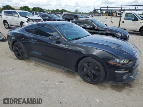 2021 Ford Mustang GT with VIN 1FA6P8CFXM5147543, listed as a Copart auction lot 61765065 with 36,825 mi miles and Salvage title. Bid and sale history available at DreamBid. Image 4.