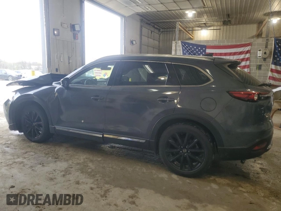 2021 Mazda CX-9 Grand Touring z VIN JM3TCBDYXM0516394, wystawiony jako Copart lot #52505215 z przebiegiem Nie podano mil oraz Szkoda całkowita • Salvage title. Historia ofert i sprzedaży dostępna na DreamBid. Obrazek 2.