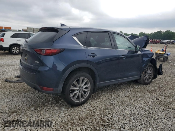 2019 Mazda CX-5 Grand Touring with VIN JM3KFBDM4K0676946, listed as a Copart auction lot 61040465 with Not provided miles and Salvage title. Bid and sale history available at DreamBid. Image 3.