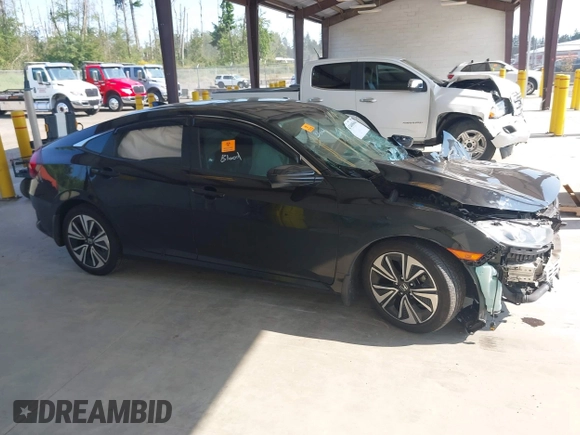 2016 Honda Civic EX-L z VIN 2HGFC1F76GH650308, wystawiony jako IAAI lot #42408661 z przebiegiem Nie podano mil oraz . Historia ofert i sprzedaży dostępna na DreamBid. Obrazek 13.