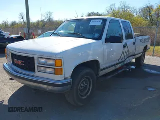 1999 GMC Sierra 3500 z VIN 1GTGC33R4XF094778, wystawiony jako IAAI lot #41229630 z przebiegiem 199 345 mil mil oraz . Historia ofert i sprzedaży dostępna na DreamBid. Obrazek 18.