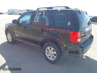 2008 Mazda Tribute Grand Touring with VIN 4F2CZ02Z28KM14136, listed as a IAAI auction lot 41878738 with 155,465 mi miles. Bid and sale history available at carsss.com. Image 3.