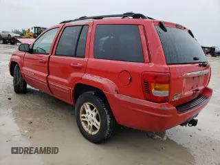 1999 Jeep Grand Cherokee Limited with VIN 1J4G268S8XC758964, listed as a Copart auction lot 71442794 with 321,284 mi miles and Non repairable. Bid and sale history available at DreamBid. Image 3.