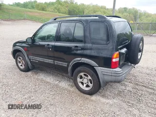 2004 Chevrolet Tracker ZR2 with VIN 2CNBJ734646907924, listed as a IAAI auction lot 42088809 with 98,797 mi miles and . Bid and sale history available at DreamBid. Image 3.