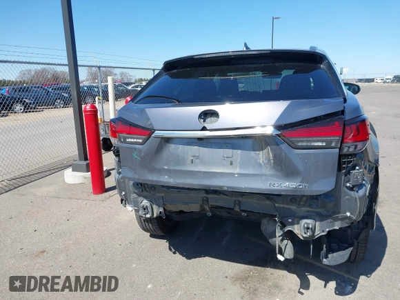 2020 Lexus RX 450h with VIN 2T2JGMDA2LC053394, listed as a IAAI auction lot 41979007 with 56,331 mi miles and . Bid and sale history available at DreamBid. Image 17.