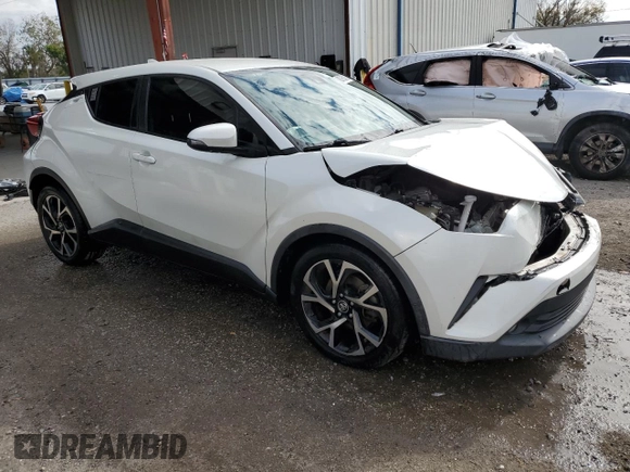 2018 Toyota C-HR XLE with VIN JTNKHMBX4J1002800, listed as a Copart auction lot 88785135 with 69,335 mi miles and Salvage Title. Bid and sale history available at carsss.com. Image 4.