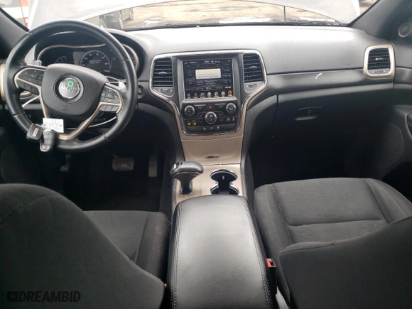 2015 Jeep Grand Cherokee Altitude with VIN 1C4RJFAG0FC209734, listed as a Copart auction lot 52973105 with 130,955 mi miles and Salvage Title. Bid and sale history available at carsss.com. Image 8.